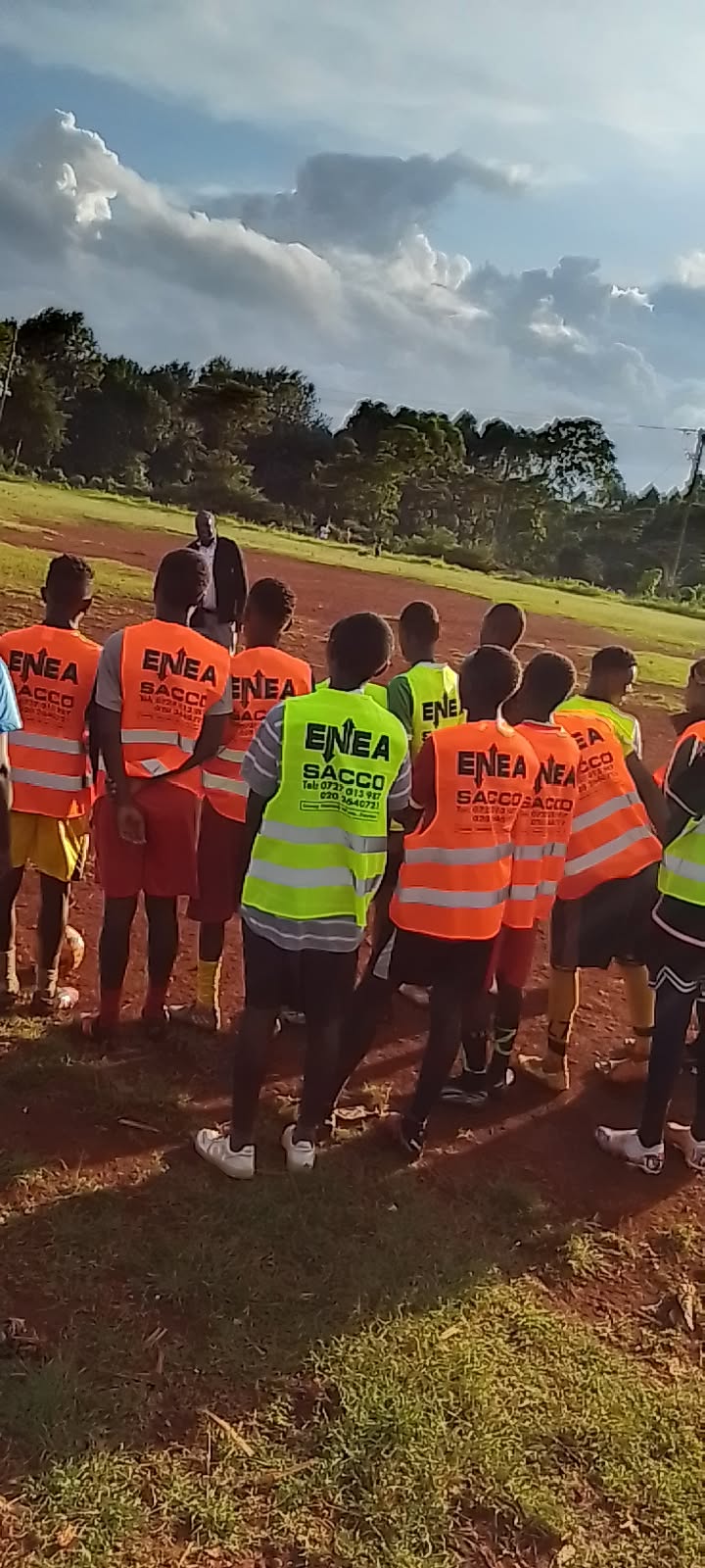 ENEA SACCO community sports and field team wearing branded safety vests